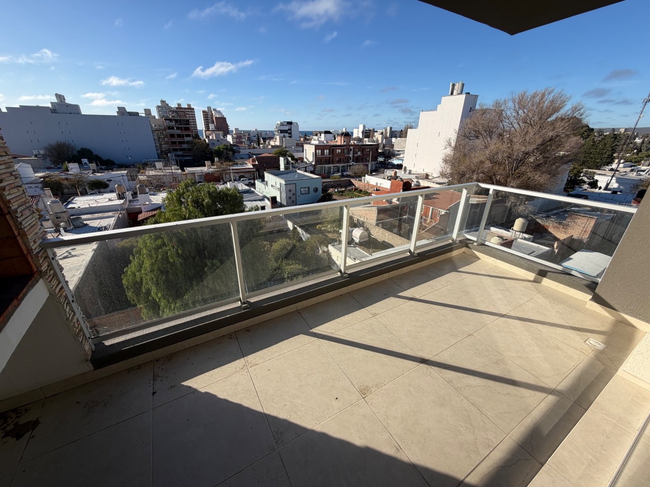 DEPARTAMENTO DE 2 DORMITORIOS CON COCHERA 