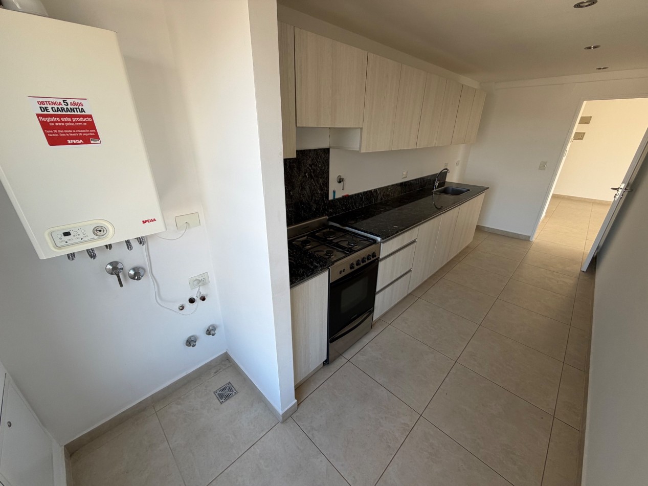 DEPARTAMENTO DE 2 DORMITORIOS CON COCHERA 