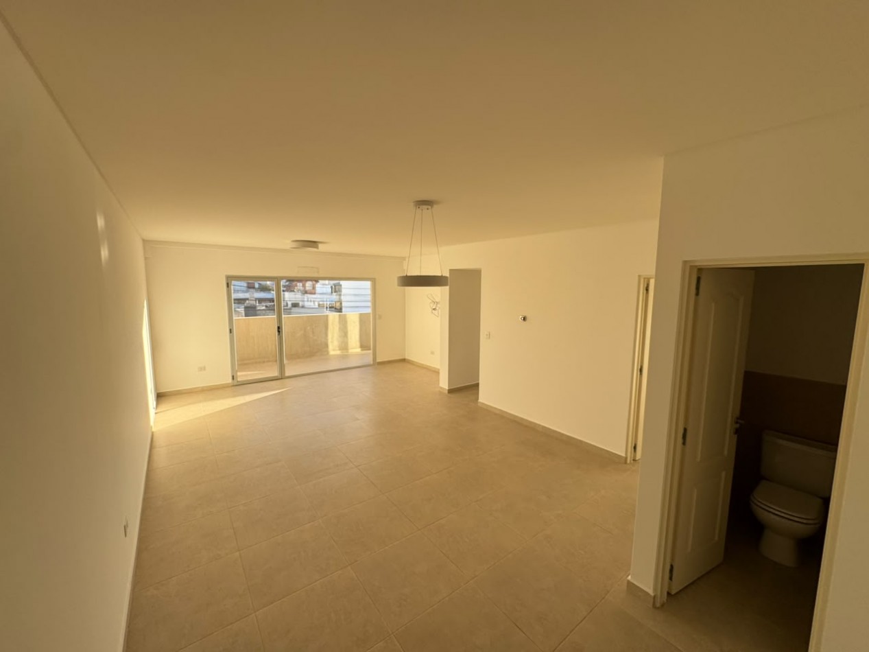 EXCELENTE DEPTO 2 DORMITORIOS CON COCHERA Y EXCLUSIVA TERRAZA