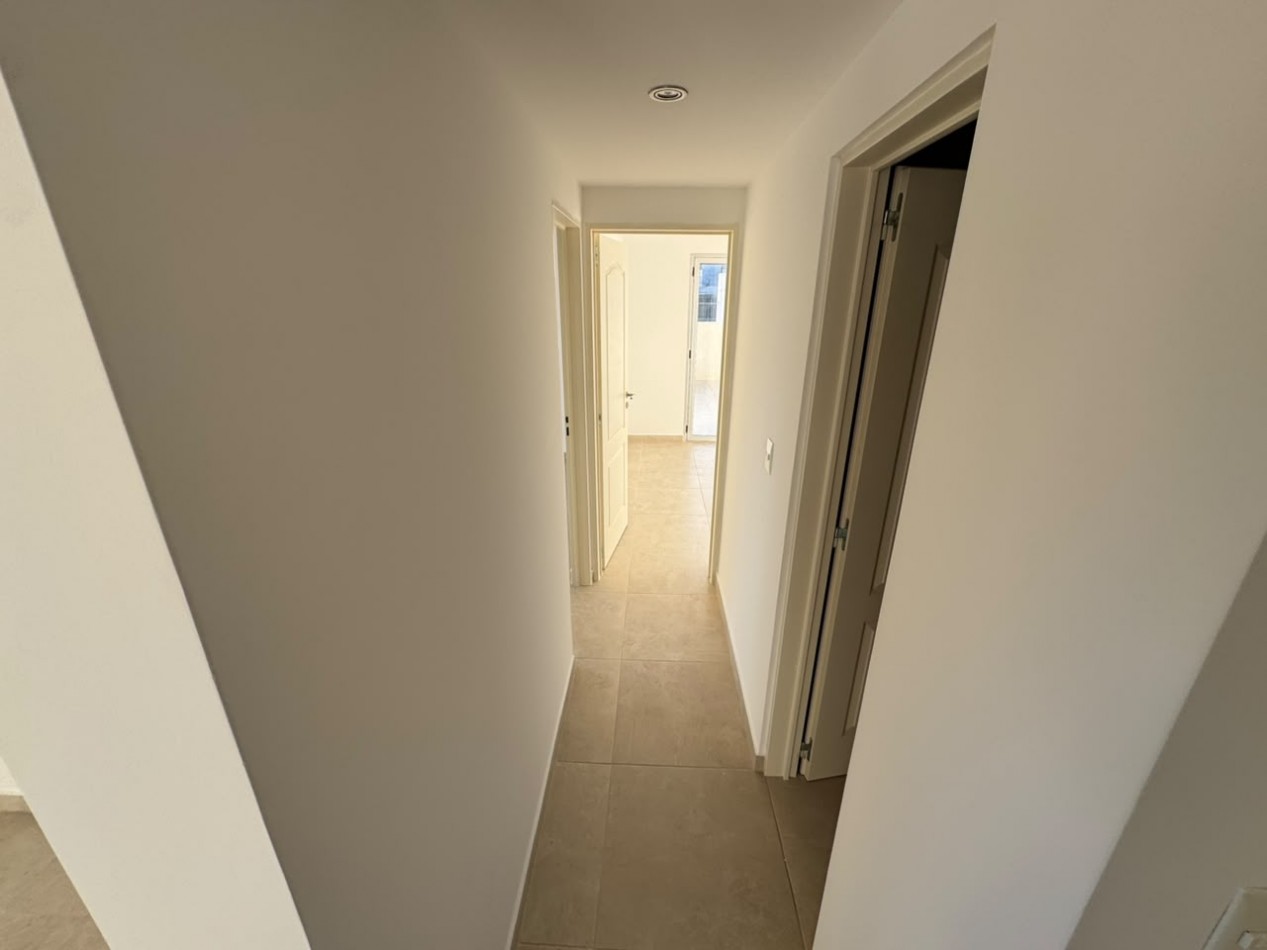 EXCELENTE DEPTO 2 DORMITORIOS CON COCHERA Y EXCLUSIVA TERRAZA