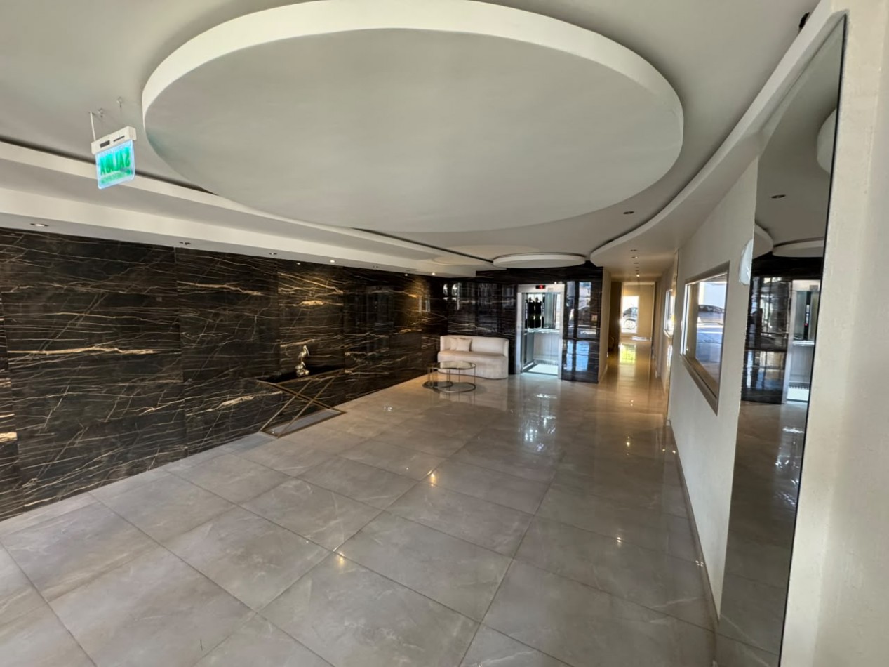 EXCELENTE DEPTO 2 DORMITORIOS CON COCHERA Y EXCLUSIVA TERRAZA