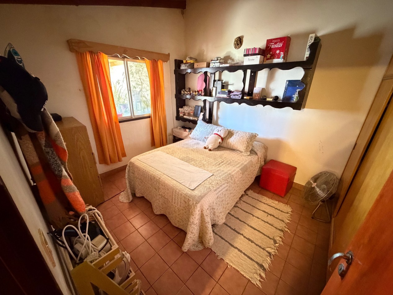 CASA DE 2 DORMITORIOS CON COCHERA Y PATIO